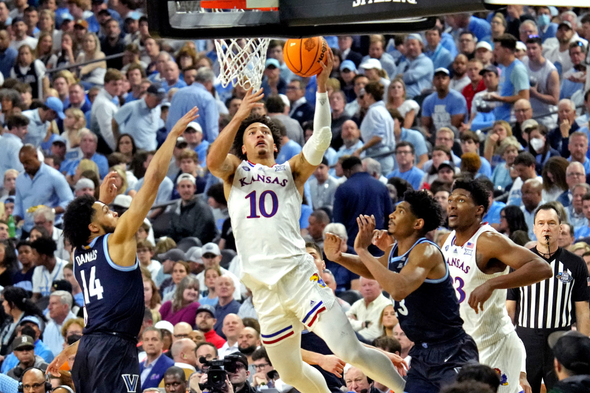 Apr 2, 2022; New Orleans, LA, USA; Kansas Jayhawks forward Jalen Wilson (10) shoots the ball against Villanova Wildcats guard Caleb Daniels (14) during the second half in the 2022 NCAA men's basketball tournament Final Four semifinals at Caesars Superdome. Mandatory Credit: Robert Deutsch-USA TODAY Sports